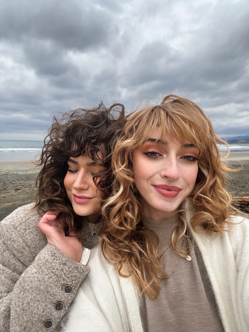 Taydem (left, blonde) and Moe behind the chair at the salon