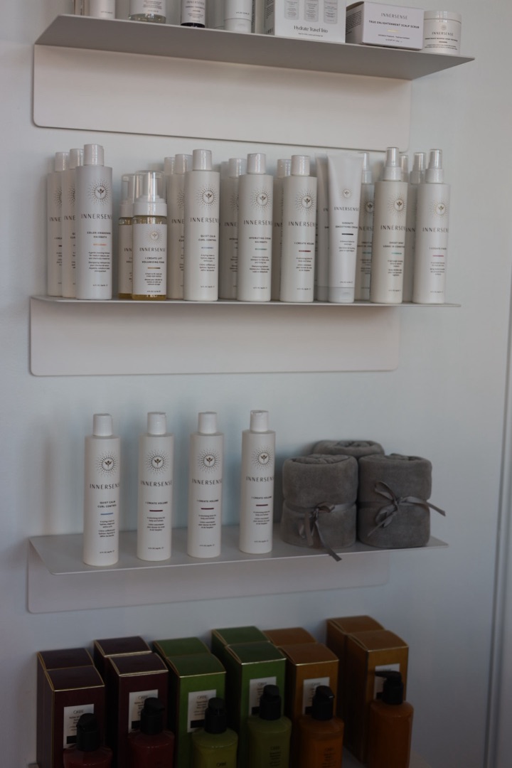 Innersense product wall at the salon